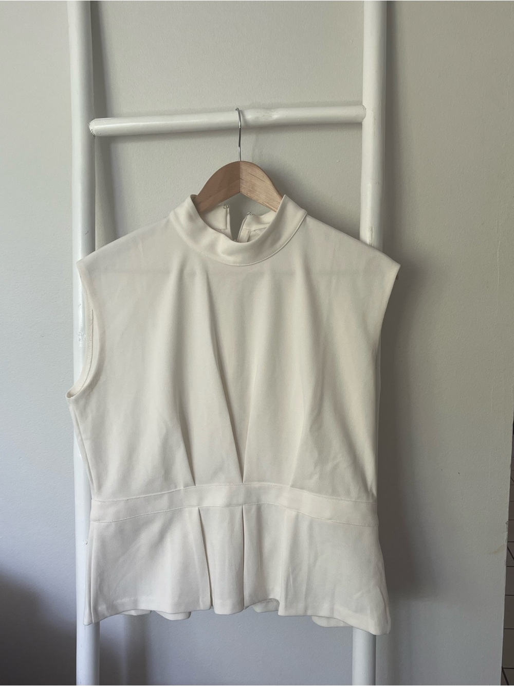 Club Monaco Sleeveless Mock Neck Peplum Top in Creamy White